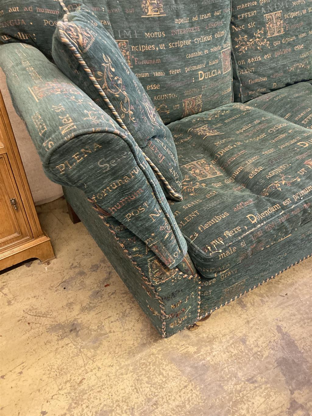 A modern contemporary upholstered two seater sofa upholstered in patterned green fabric, length 178cm, depth 97cm, height 78cm